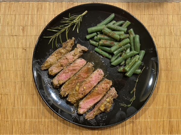 Pepersteak met knoflook-miso boter